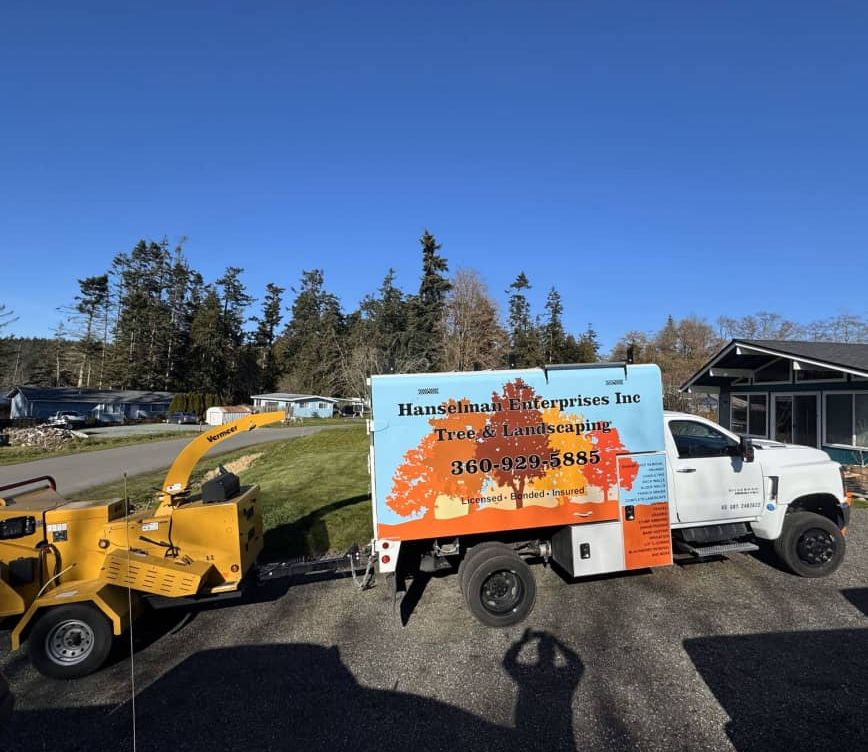 truck with Hanselman Enterprises Signage